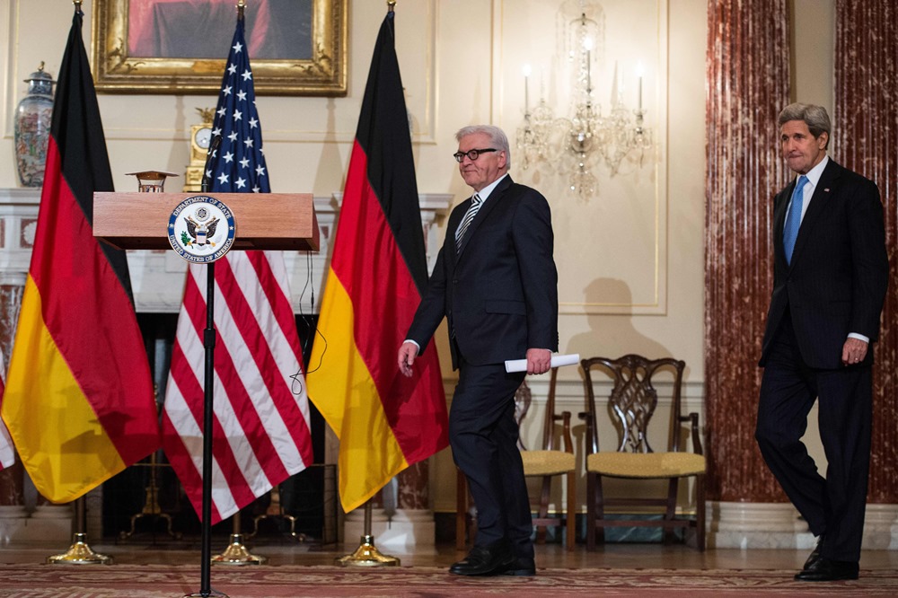 A photo taken on March 11, 2015 shows US Secretary of State John Kerry (R) and German Foreign Minister Frank -Walter Steinmeier arriving to speak to the press at the State Department in Washington, DC during Steinmeier's visit to USA. Germany said on July 22, 2015 it was 