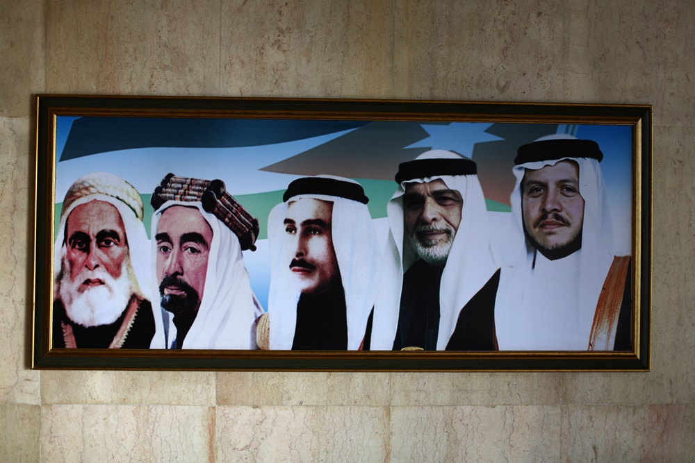 A painting showing Jordanian monarchs AFP PHOTO / PATRICK BAZ