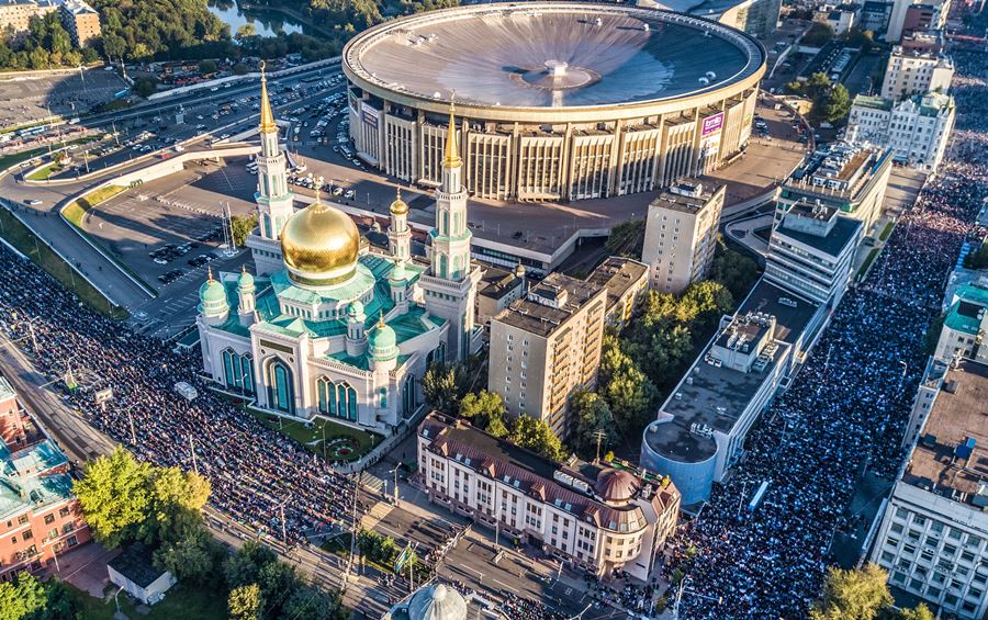An aerial view shows members of Russia’s Muslim community praying in a street outside Moscow Central Mosque during Eid al-Adha celebrations on  September 1, 2017. DMITRY SEREBRYAKOV AFP / Getty Images