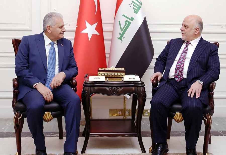 Iraqi Prime Minister Haidar al-Abadi meets with his Turkish counterpart Binali Yıldırım in Baghdad on January 7, 2017.  AFP PHOTO