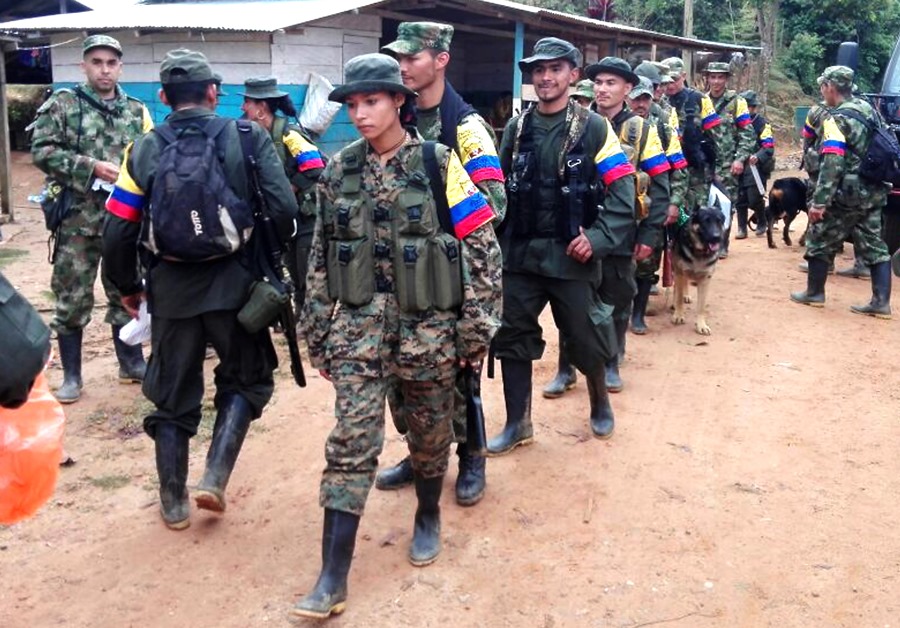 A picture released by FARC showing guerrillas arriving to hand in their weapons in Las Carmelitas on January 30, 2017; the sides started a historic disarmament process to end Latin America’s last major armed conflict.  AFP PHOTO