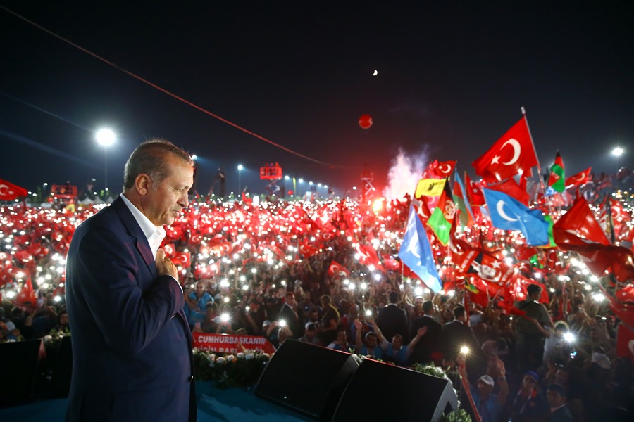 President Erdoğan greets the people at the Yenikapı rally after he delivered his speech.   AA PHOTO /  KAYHAN ÖZER