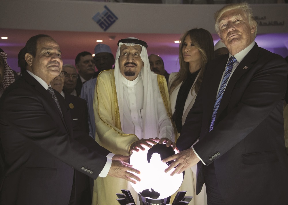 The Saudi Arabian King Selman bin Abdulaziz, U.S. President Donald Trump and Egyptian President Sisi, put their hands on the world globe during the inauguration of the Global Center for Combating Extremism in Riyadh, May 22, 2017. AA PHOTO / BANDAR ALGALOUD