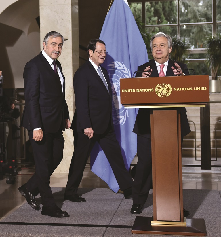 The UN General Secretary Antonio Guterres (R) and the leaders of the Turkish and Greek Cypriots, Mustafa Akıncı (L) and Nikos Anastasiadis (C) issuing a joint statement on the Cyprus crisis in January 2017. AA PHOTO / MUSTAFA YALÇIN