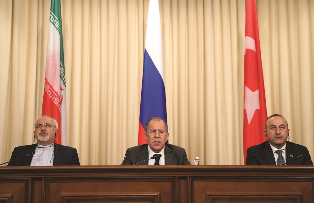 The Turkish, Russian and Iranian Ministers of Foreign Affairs (R to L) Çavuşoğlu, Lavrov and Zarif, hold a joint press conference following the trilateral talks on the incidents in Aleppo, in Moscow on December 20, 2016.  AA PHOTO /  FATİH AKTAŞ