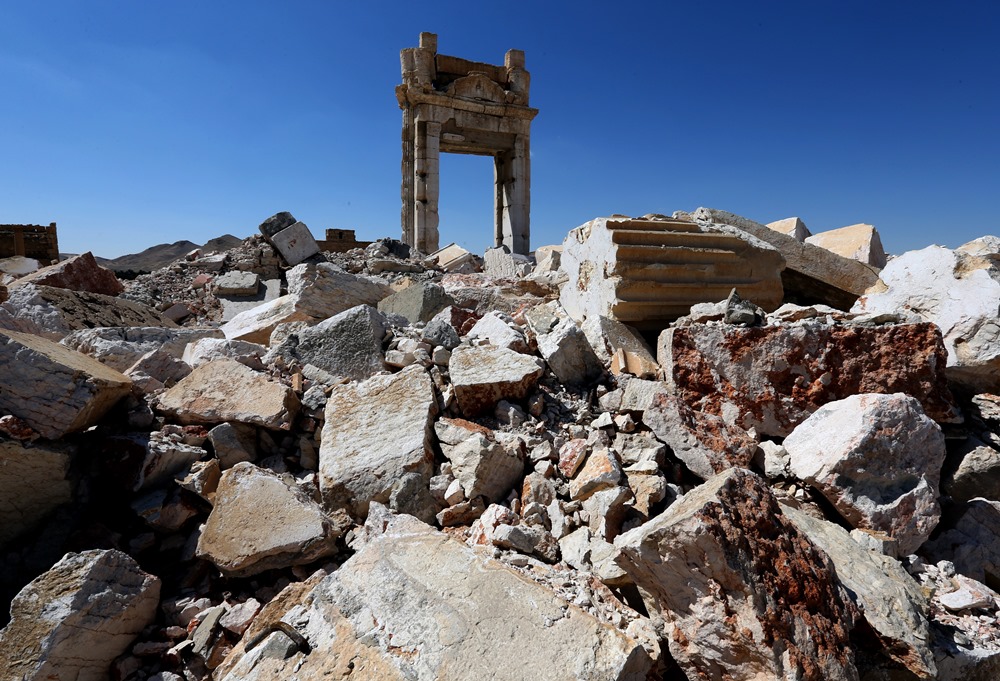 A picture shows on March 31, 2016 the remains of Temple of Bel’s “Cella”, which was blown up by jihadists of the Islamic State (IS) group in August 2015, in the ancient Syrian city of Palmyra. AFP PHOTO / JOSEPH EID