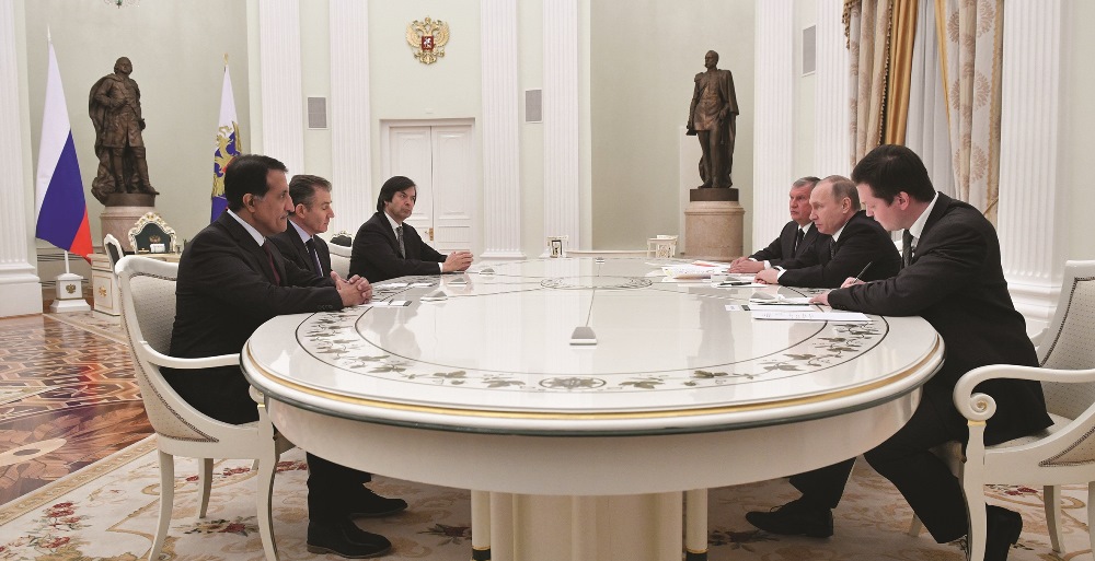 President Putin  (2nd R), accompanied by Sechin (3rd R), the CEO of oil giant Rosneft, meets with participants of the Rosneft privatisation deal on January 25, 2017. AFP PHOTO / POOL / ALEXANDER NEMENOV