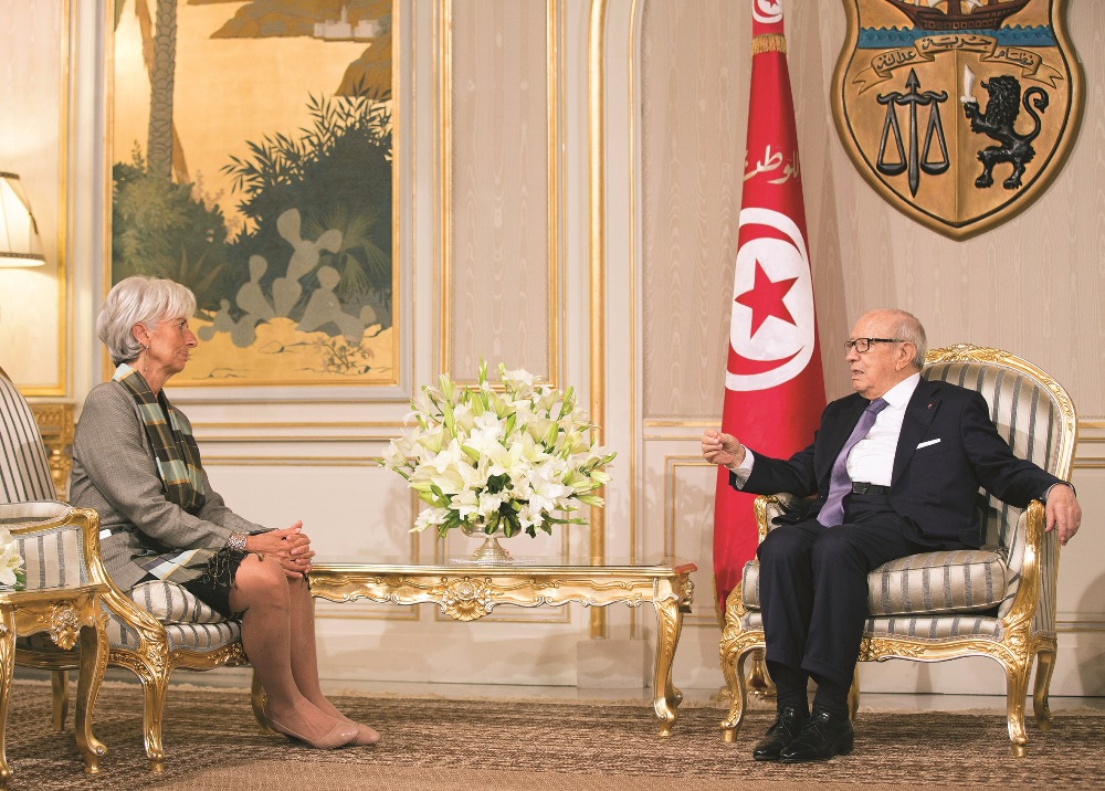 IMF Chief, Christine Lagarde, met with Tunisian President Beji Caid es-Sebsi and urged Tunisia to press ahead with the “vast number” of pending economic reforms on September 08, 2015.  AFP PHOTO /  STEPHEN JAFFE